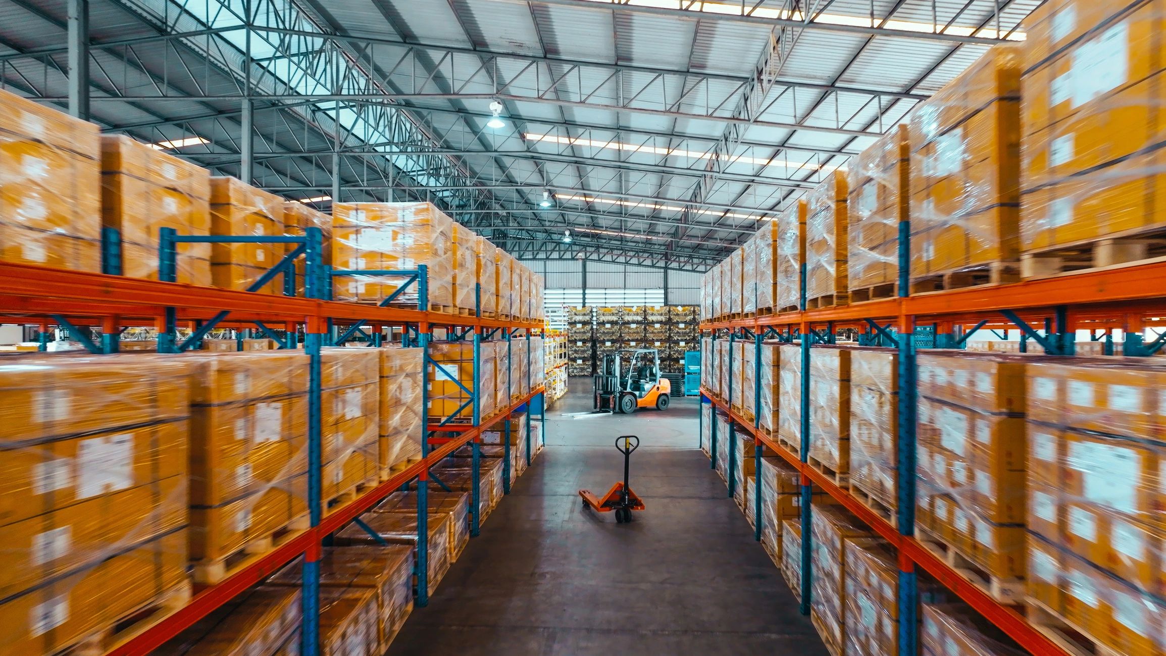 Warehouse shelves with packaged goods for logistics operations